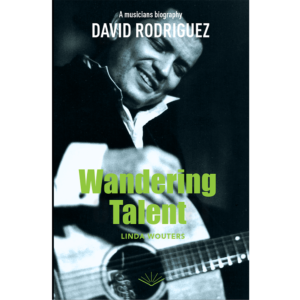 Book cover of Talent Adrift by Linda Wouters. The cover features a blue-toned photograph of musician David Rodriguez holding a guitar. The title appears in large green letters, with the subtitle Biography of a Musician at the top.